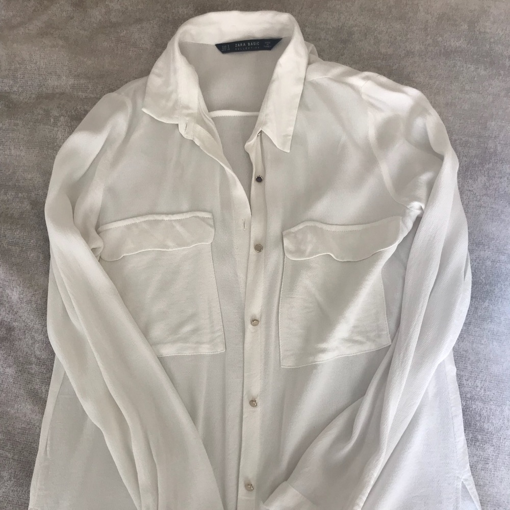 Zara women’s white linen blouse with gold buttons